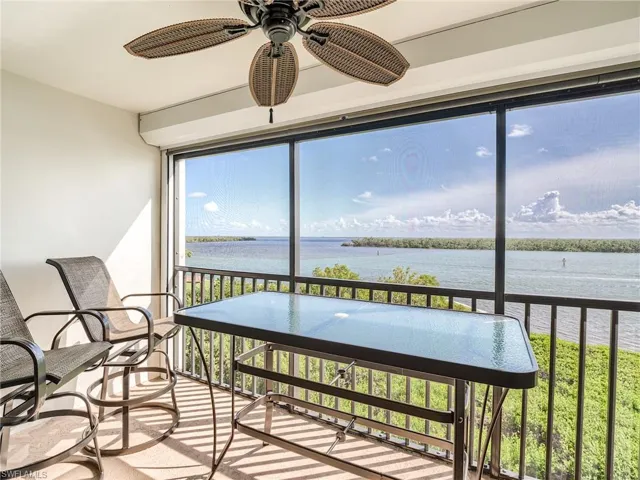 Screened in balcony overlooking views of the back bay
