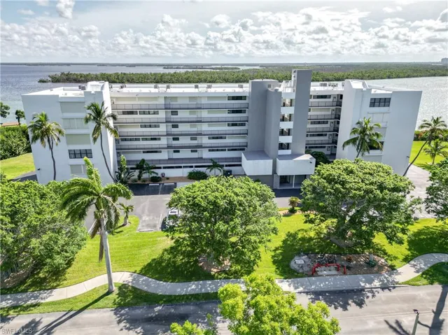 Drone / aerial view featuring water views of the back bay of Estero Island