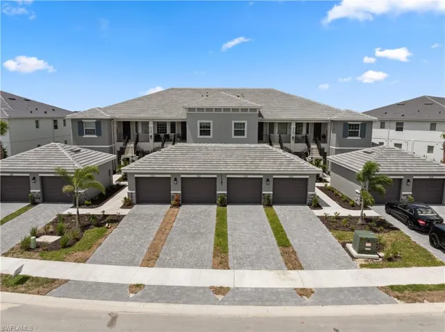 View of property featuring a garage