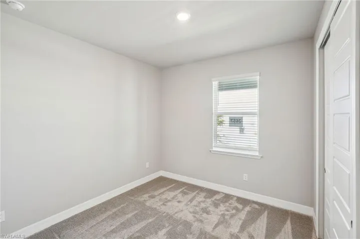 Spare room with carpet flooring
