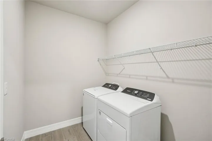 Laundry area featuring washer and clothes dryer