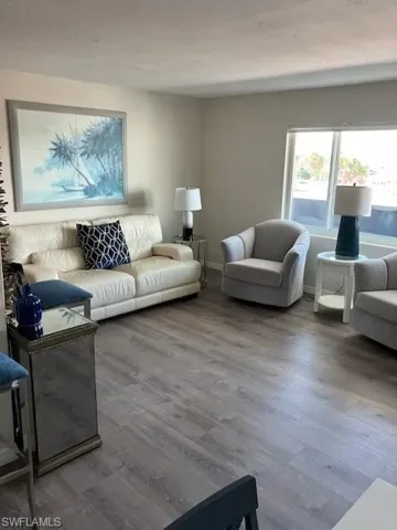 Living room featuring hardwood / wood-style floors
