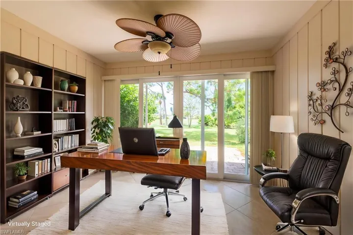 Virtually Staged as Office in Enclosed Lanai