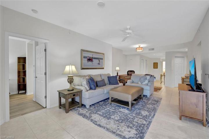 Spacious great room with access to kitchen and dining room.