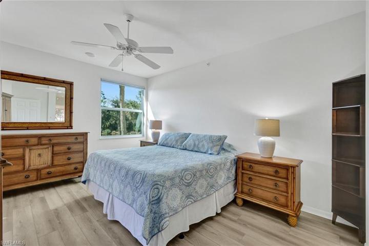 This primary bedroom is the perfect place to rest after a day at the beach!