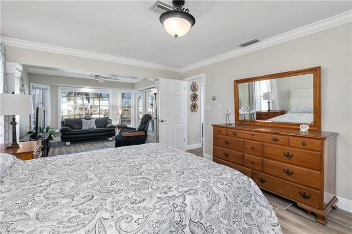Sitting room/nursery.office area/flex space in the master. There are double doors to the lanai.
