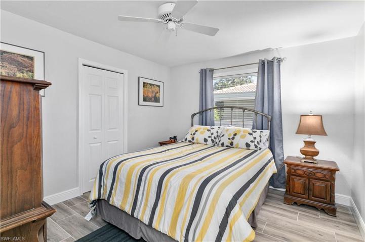 Guest bedroom with walk in closet.