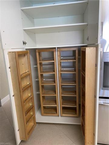 Pull out storage on the left side of the refrigerator.