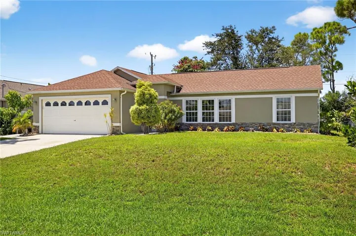 Large with High Elevation Front Yard, all Impact Windows & Doors and New Shingle Roof