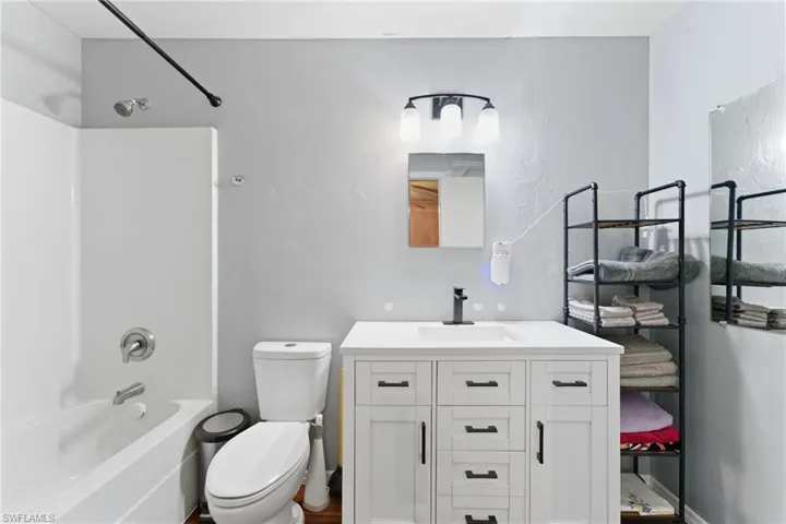 Full bath with vanity and shower / bathtub combination