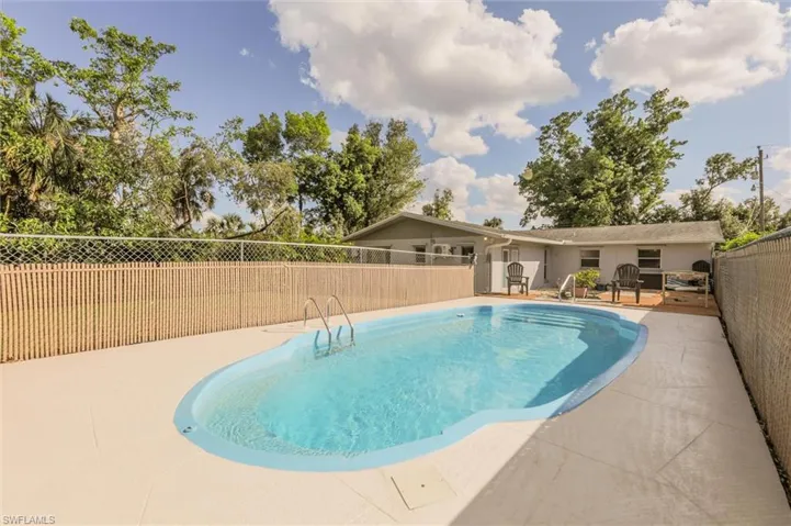 View of pool with a patio area