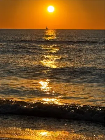View of beach at sunset