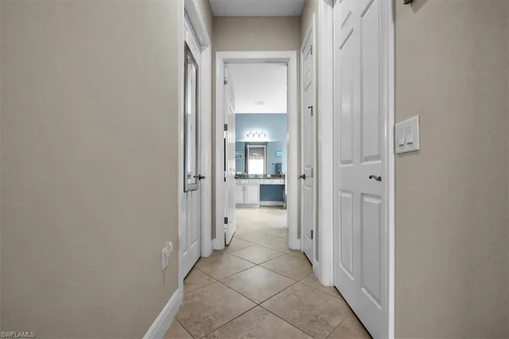 hallway to closets and master bath