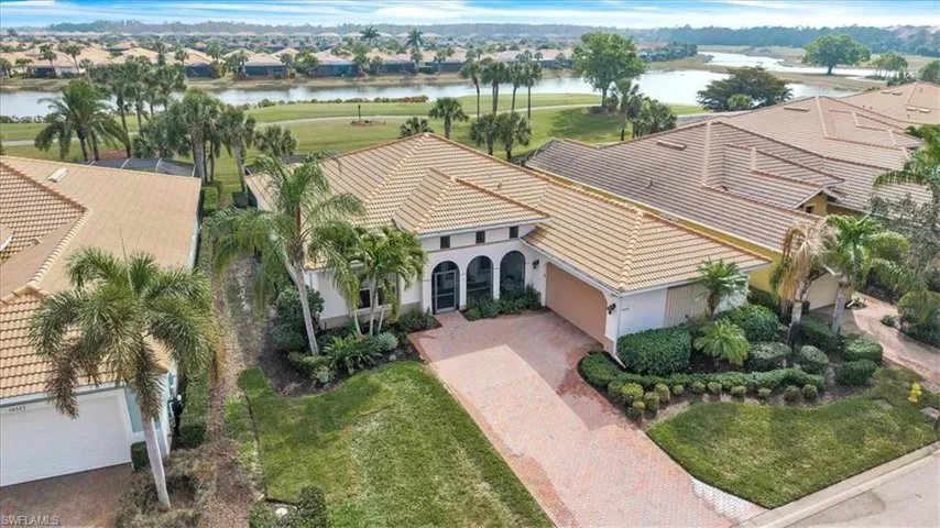 Front of Home backing up to golf course and water