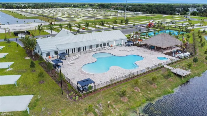 Aerial view of a pool area Palm Breeze Resort
