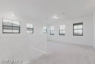 Empty room featuring carpet