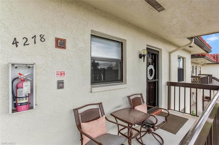 Enjoy the walkers and bikers as you sit on the front lanai