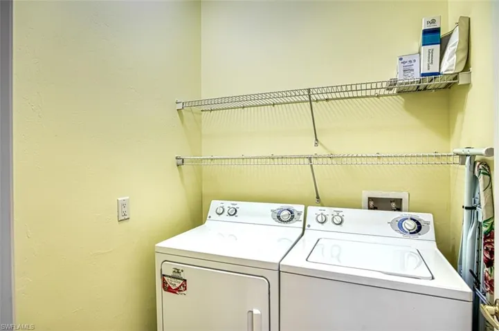 Clothes washing area with washer and dryer