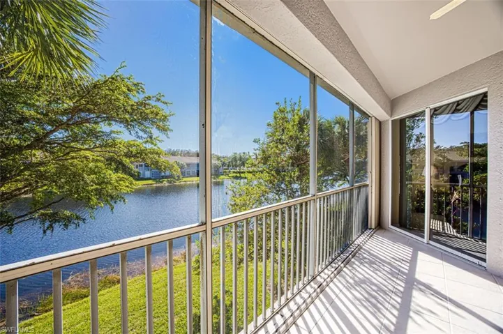 Unfurnished sunroom with a water view
