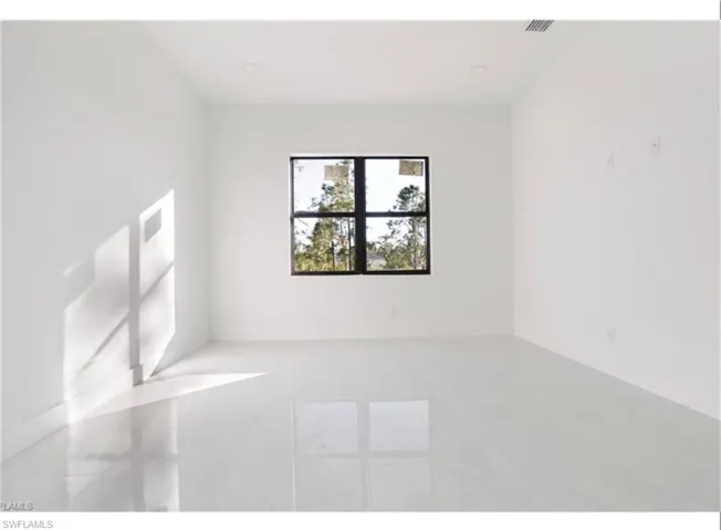Unfurnished room featuring recessed lighting