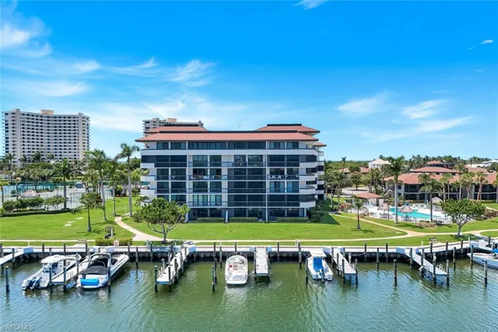 Aerial view of building and available boat slips for lease