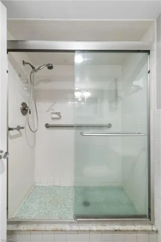 Bathroom featuring walk in shower