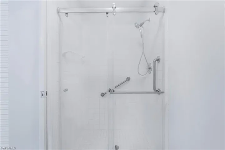 Full bath featuring a stall shower