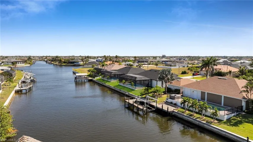 Bird's eye view featuring a water view and a residential view