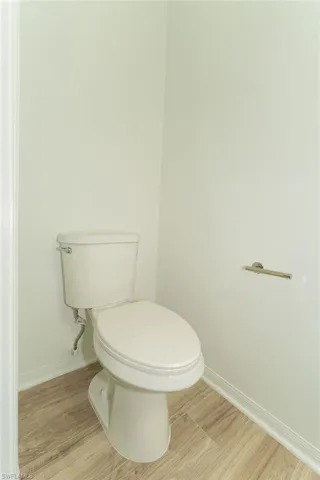Bathroom with wood finished floors