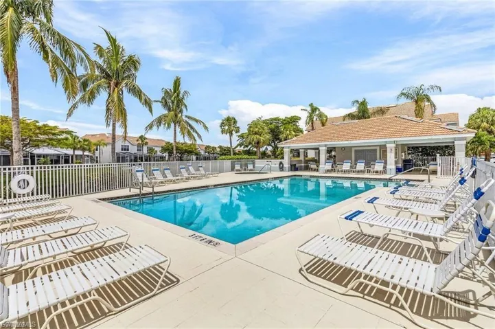 Community pool with a patio area