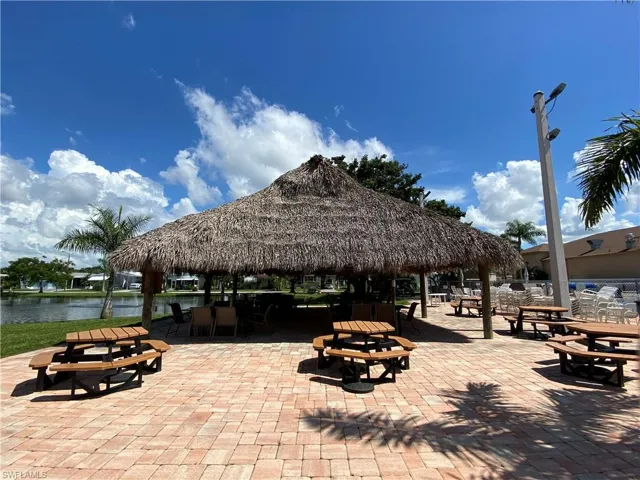 View of property's community featuring a gazebo and a patio area