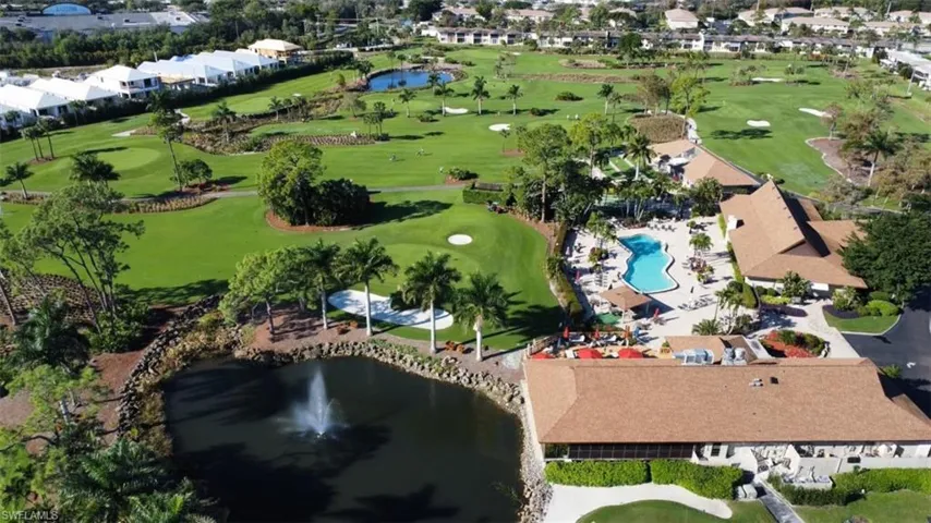 Aerial view of the 19th hole restaurant, main pool, clubhouse and Palmetto golf course.