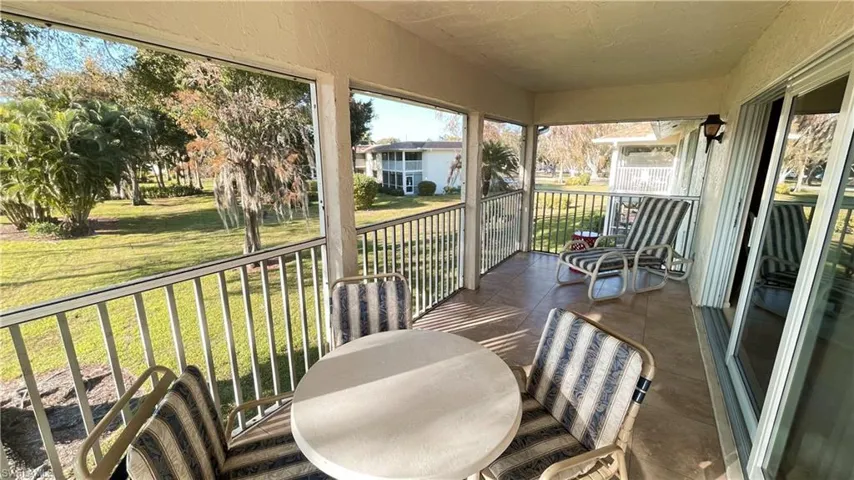 Screened lanai overlooking courtyard.
