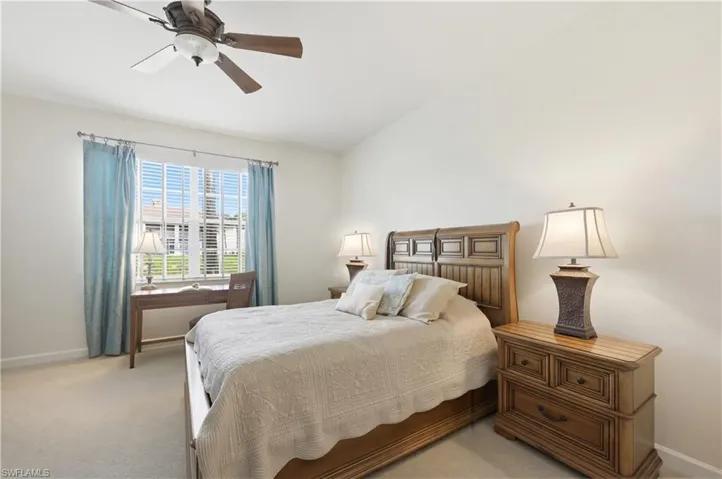 Room featuring neutral wall tones and light-toned carpeting