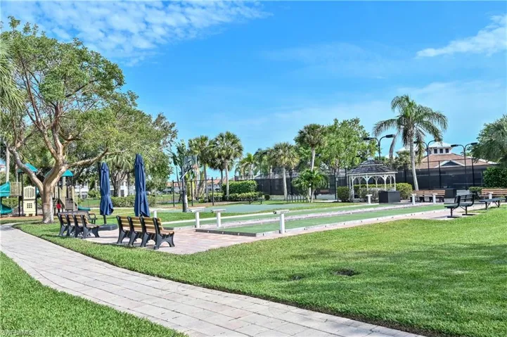 Outdoor recreation area featuring bocce ball courts and a gazebo
