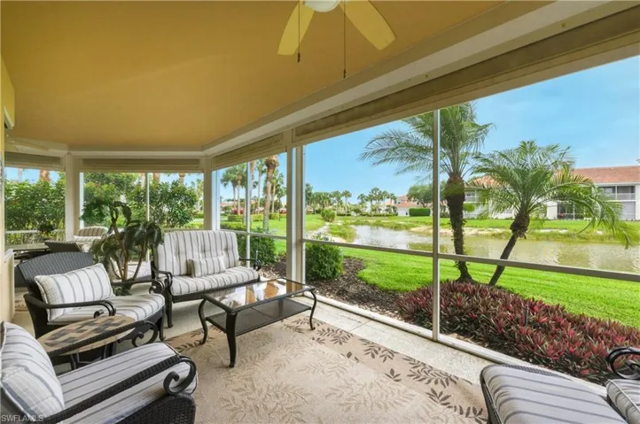 Screened patio featuring a ceiling fan, recessed lighting, and a neutral-toned ceiling