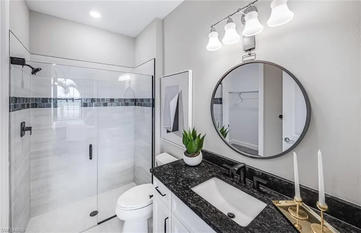 Bathroom off of bedroom on 1st floor