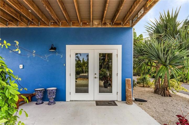 Front door leading to interior staircase