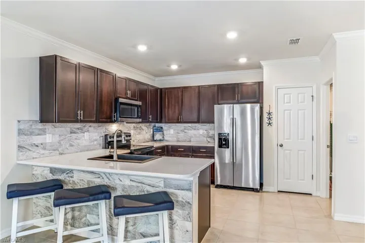 Beautiful tile bar front and backsplash