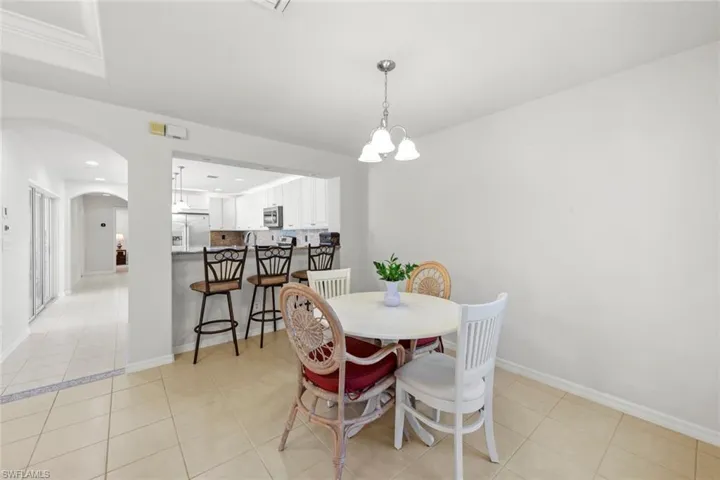 Dining area looking into kitchen