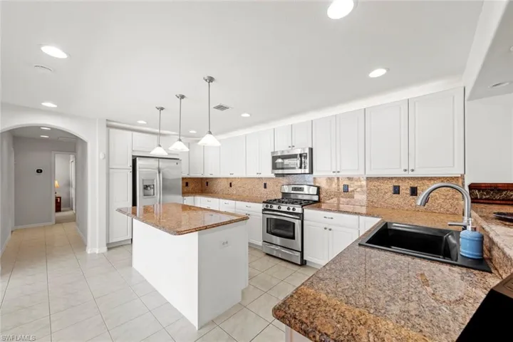 Granite counters, stainless appliances.
