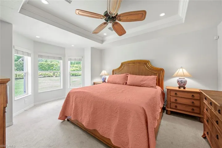 Master bedroom w/large bay window overlooking back  yard