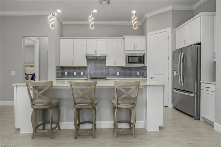 Enjoy custom designer LED lighting, a natural gas stove and an open kitchen, living, dining area--perfect for entertaining.