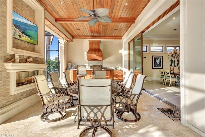 Large Covered Lanai also features a Fireplace, Bar & Summer Kitchen