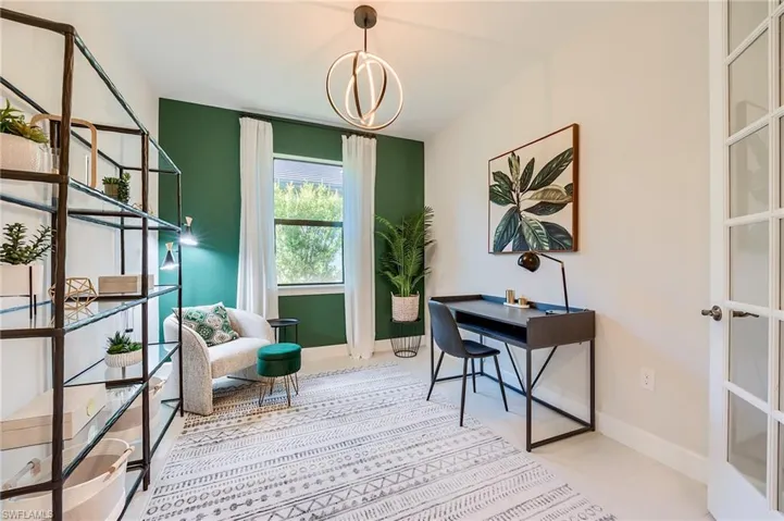 Office featuring an inviting chandelier