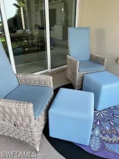 Relax on the screened lanai overlooking the lake.