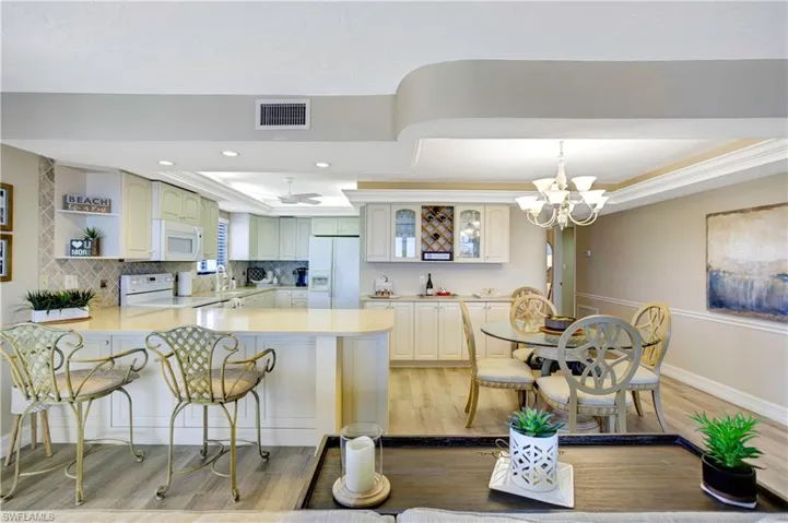 Reconstructed kitchen -walls removed, recessed lighting, plenty of cabinets.