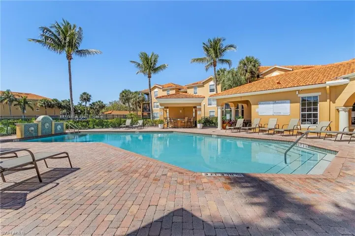 Pool featuring a patio area and fence
