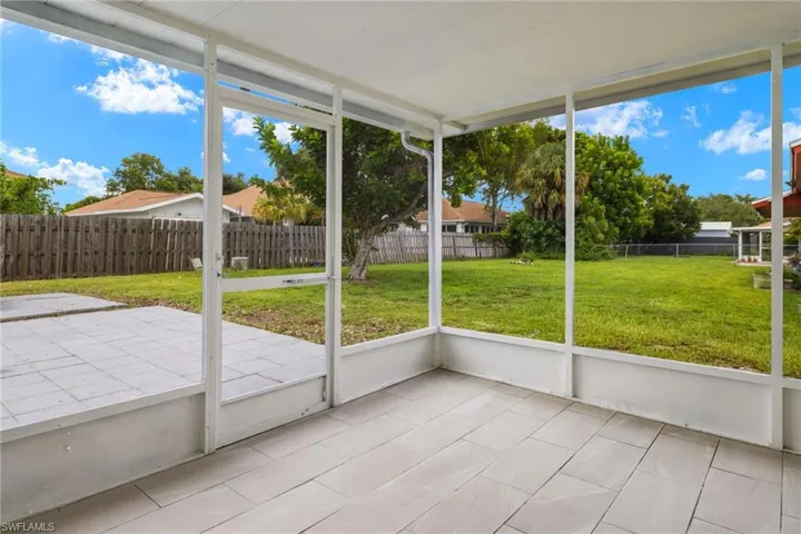 Unfurnished sunroom with plenty of natural light