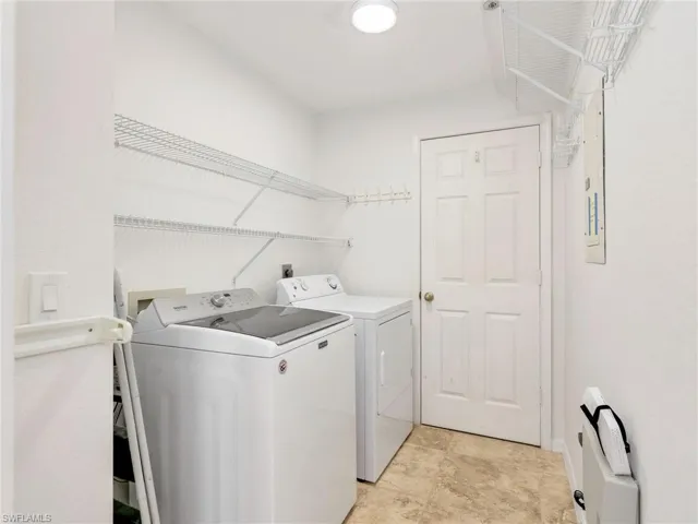 Laundry area featuring washing machine and dryer